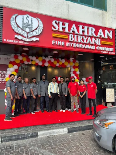 The Shahran Biryani team outside the Al Nahda branch